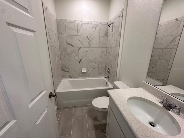 full bathroom with  shower combination, vanity, and toilet