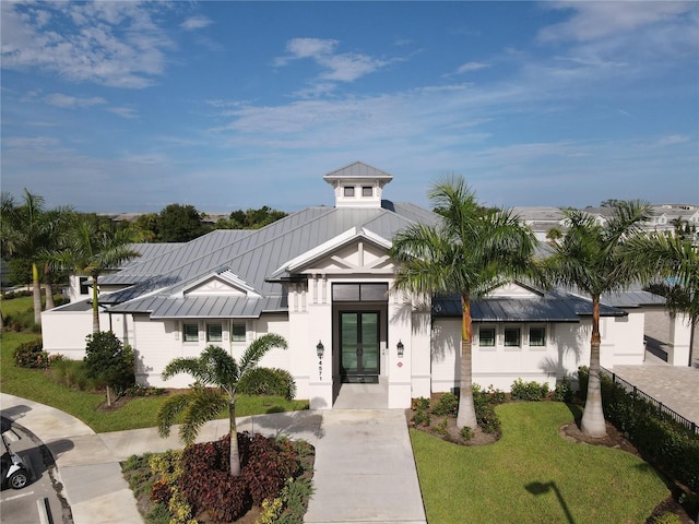 view of front of property with a front lawn