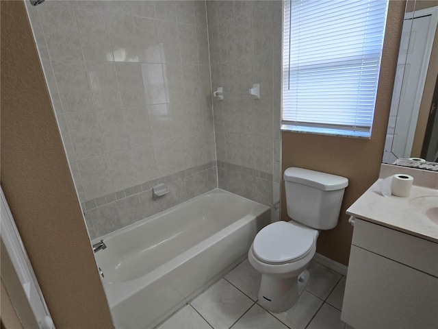 full bathroom with tile patterned floors, vanity, tub / shower combination, and toilet