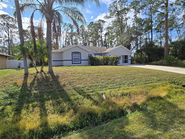 single story home featuring a front yard