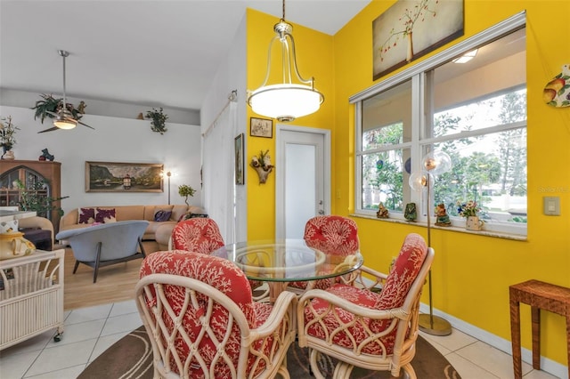 dining room featuring ceiling fan and light tile patterned floors