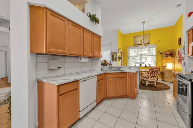 kitchen with sink, stainless steel range with electric cooktop, decorative backsplash, white dishwasher, and kitchen peninsula