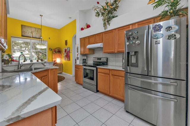 kitchen featuring light tile patterned flooring, tasteful backsplash, sink, light stone counters, and stainless steel appliances