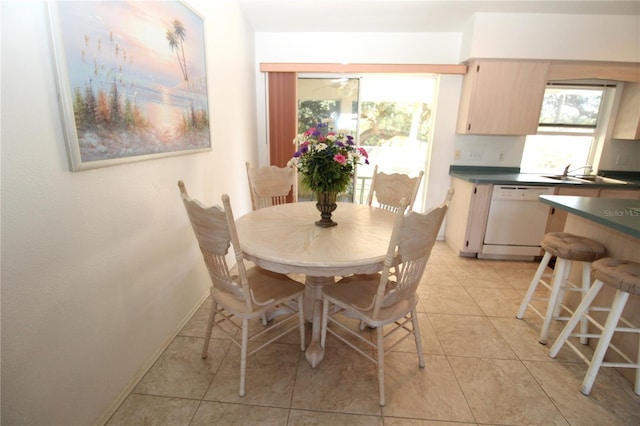 tiled dining space with sink