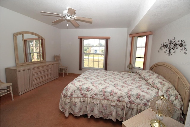 bedroom with ceiling fan and light colored carpet