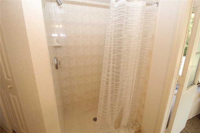 bathroom featuring walk in shower