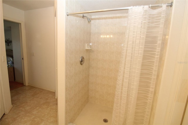 bathroom with a shower with shower curtain