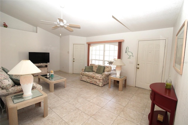 living room with ceiling fan and lofted ceiling