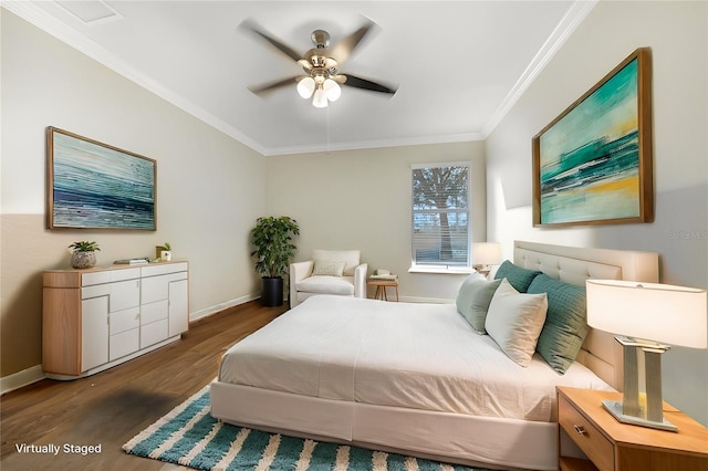 bedroom with crown molding, dark wood-type flooring, and ceiling fan