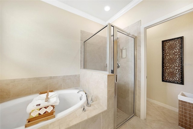 bathroom featuring tile patterned flooring, crown molding, and separate shower and tub