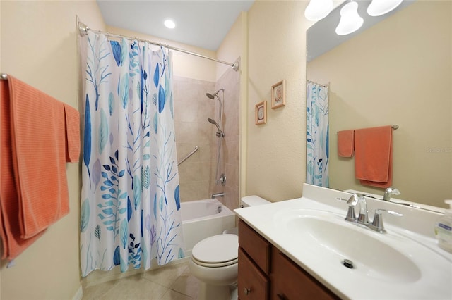 full bathroom with tile patterned flooring, vanity, shower / bath combo, and toilet