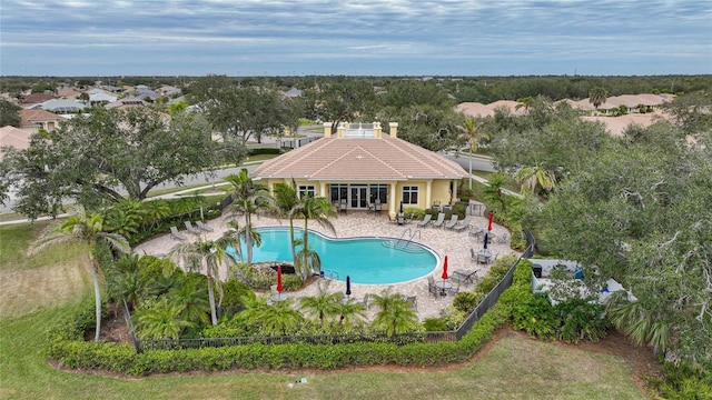 view of swimming pool with a patio