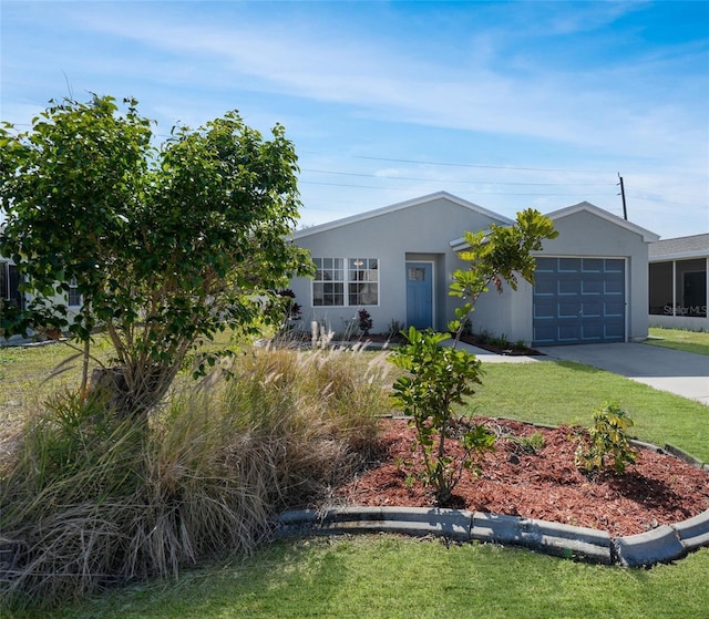 single story home with a garage and a front yard