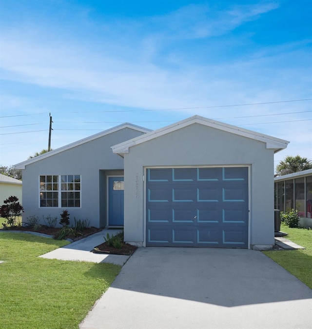 ranch-style house with a garage and a front yard