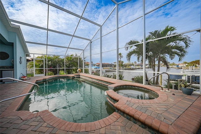 view of swimming pool with a water view, a patio, glass enclosure, and an in ground hot tub