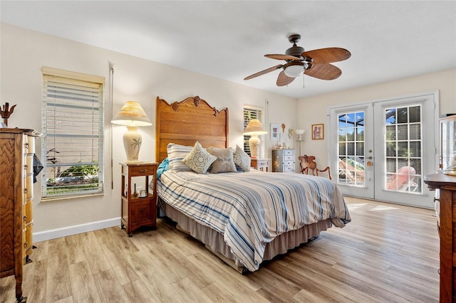 bedroom featuring access to outside, french doors, ceiling fan, and light wood-type flooring