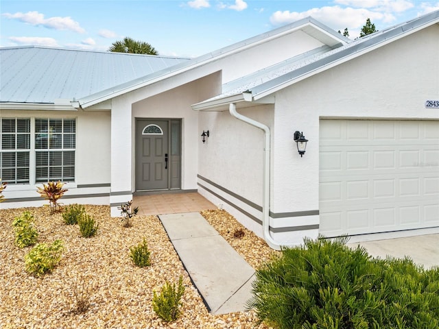 property entrance featuring a garage