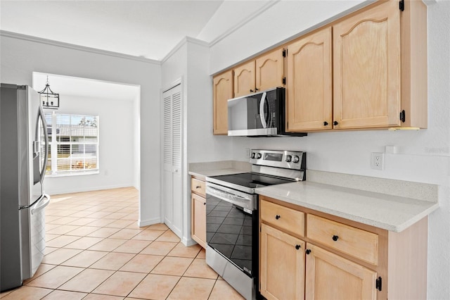 kitchen featuring light brown cabinets, light tile patterned floors, ornamental molding, and stainless steel appliances