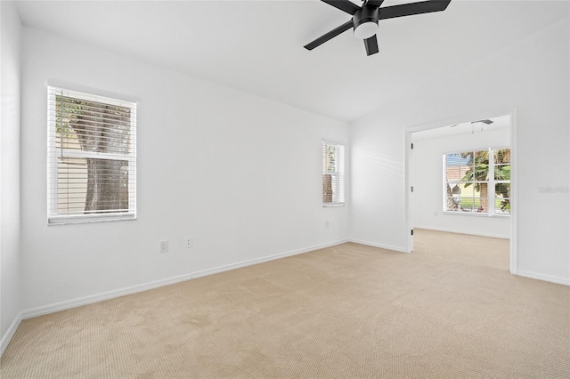 carpeted empty room with ceiling fan