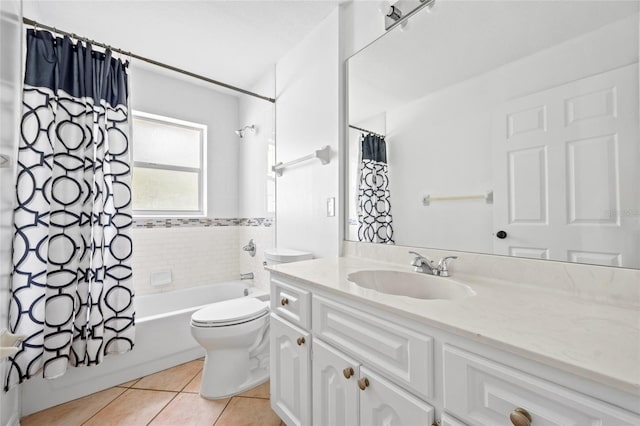 full bathroom featuring toilet, shower / bathtub combination with curtain, tile patterned floors, and vanity