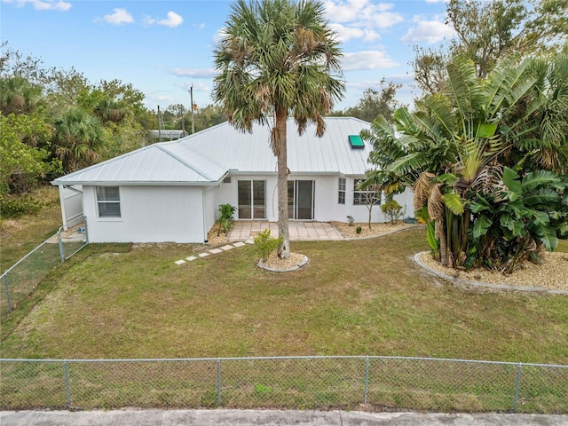 view of front of home with a front lawn