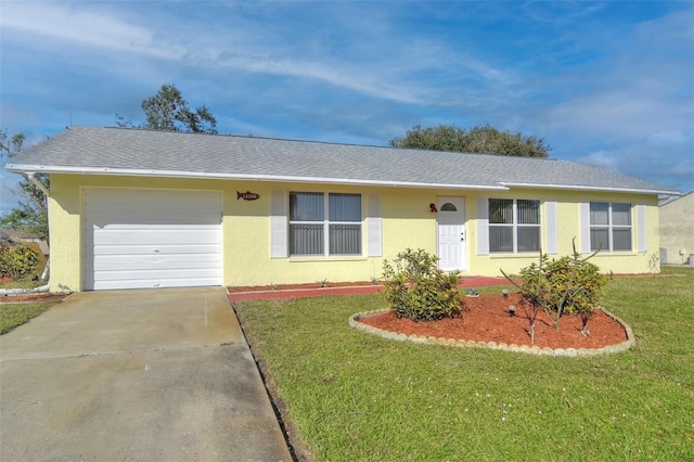 ranch-style house with a garage and a front yard