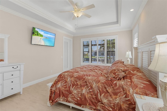 bedroom featuring ceiling fan, ornamental molding, and a raised ceiling