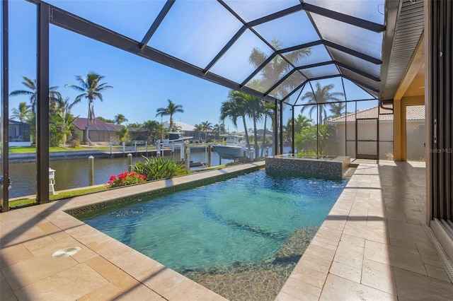 view of swimming pool featuring a lanai, a boat dock, a patio area, and a water view