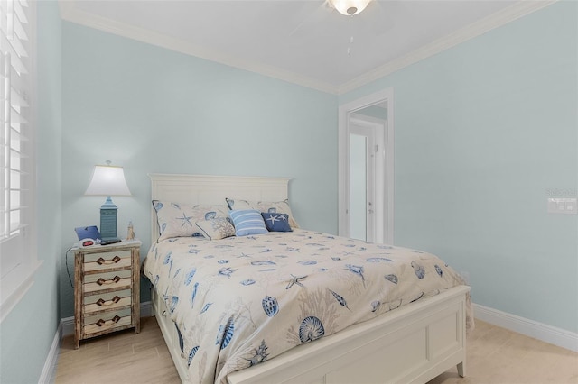 bedroom with ceiling fan, light hardwood / wood-style floors, and crown molding