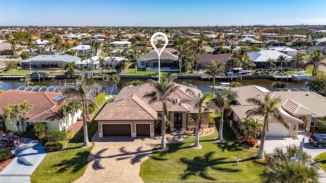 bird's eye view with a water view