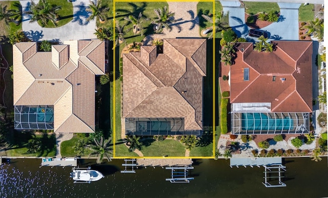 drone / aerial view with a water view