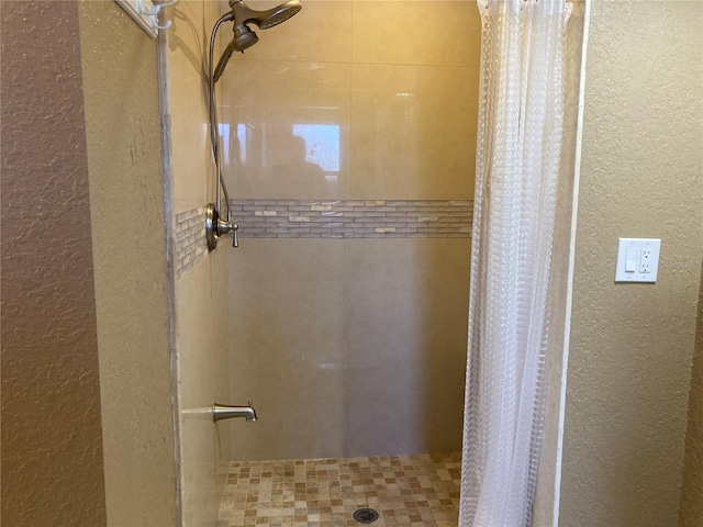 bathroom with curtained shower