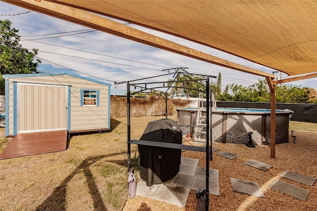 view of patio / terrace featuring a storage unit