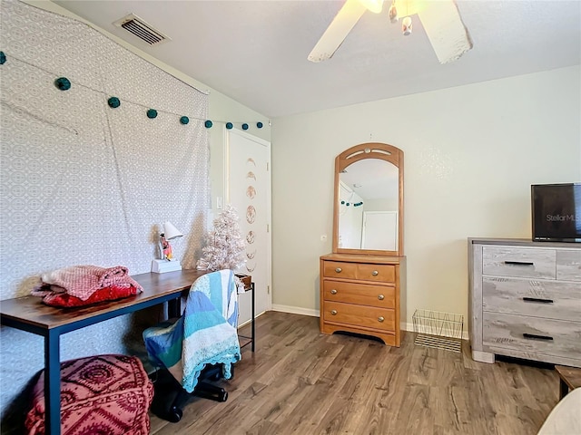 office area with hardwood / wood-style flooring and ceiling fan