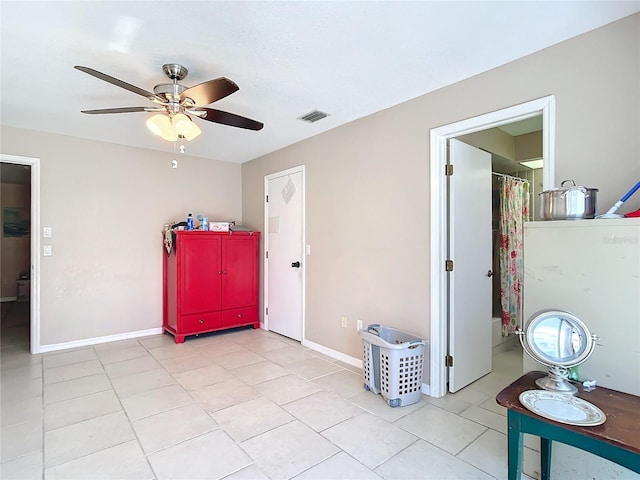 entrance foyer featuring ceiling fan