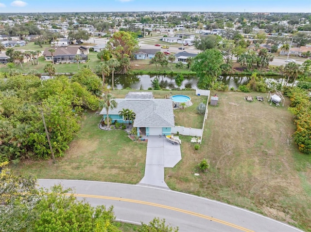 bird's eye view with a water view