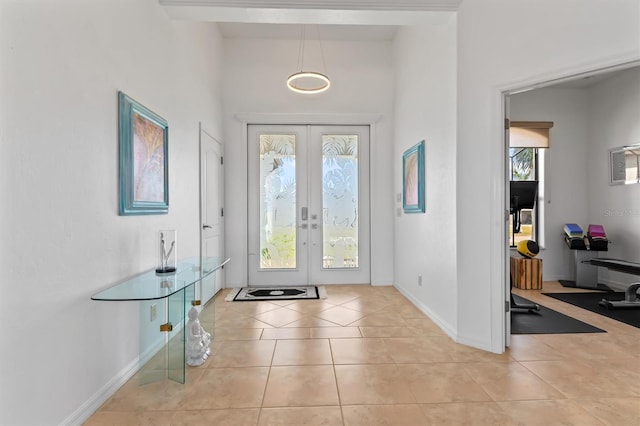 tiled entryway with french doors