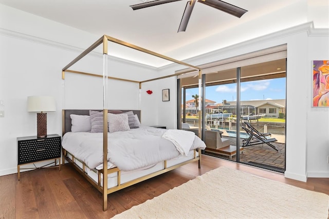 bedroom with ceiling fan, access to exterior, and dark hardwood / wood-style flooring