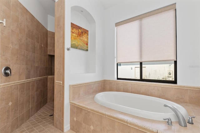 bathroom with separate shower and tub