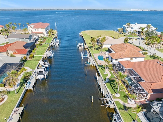 bird's eye view with a water view