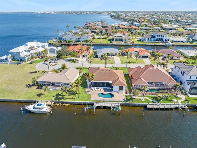 bird's eye view with a water view