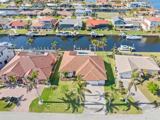 drone / aerial view with a water view