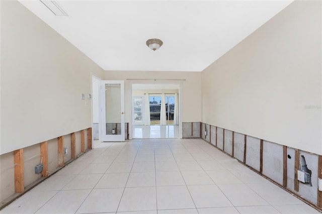 view of tiled spare room