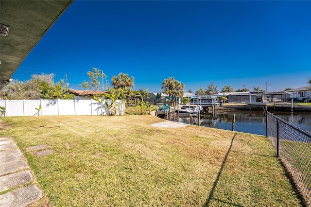 view of yard featuring a water view