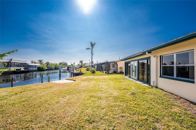 view of yard with a water view