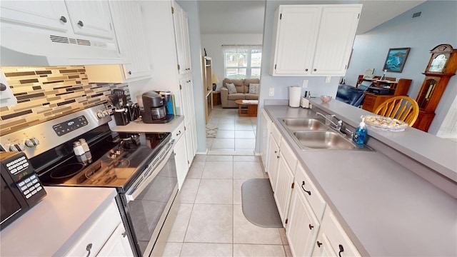 kitchen featuring white cabinetry, sink, and stainless steel electric range