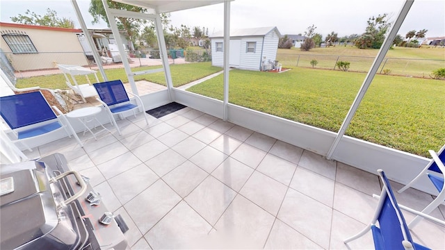 unfurnished sunroom with plenty of natural light