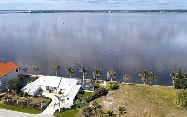 birds eye view of property featuring a water view