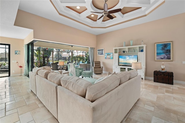 living room with ceiling fan, coffered ceiling, a high ceiling, crown molding, and beam ceiling