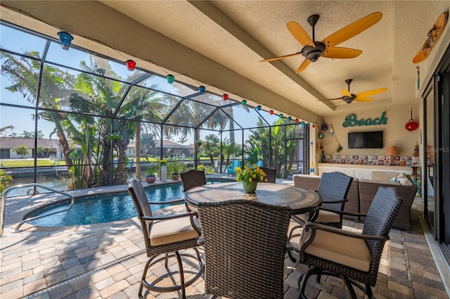 view of patio with a lanai